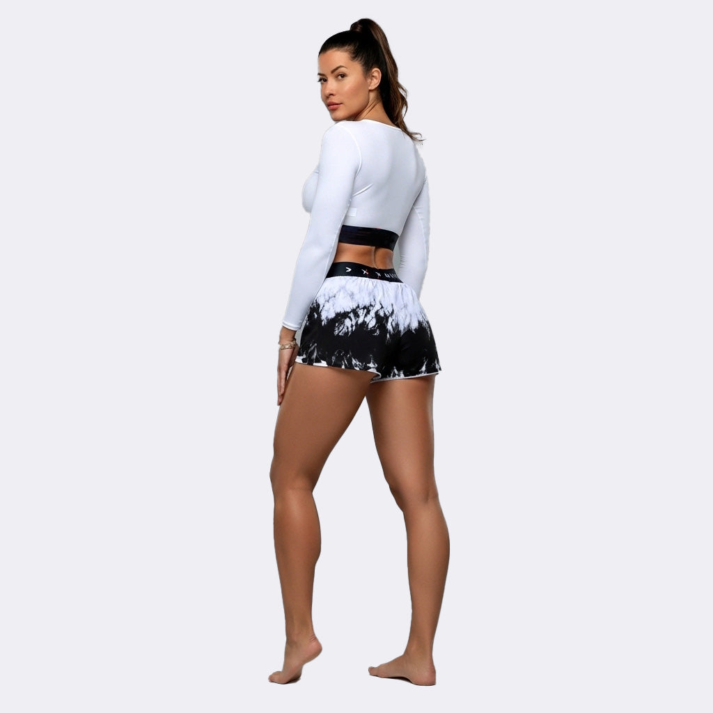 Conjunto de pantalones cortos impermeables con licra interior